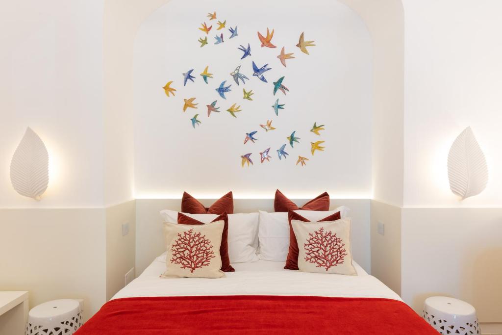 Postel nebo postele na pokoji v ubytování Suite Belvedere Capri Exclusive Rooms