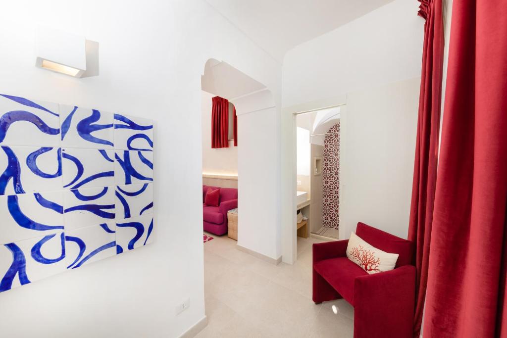 Postel nebo postele na pokoji v ubytování Suite Belvedere Capri Exclusive Rooms