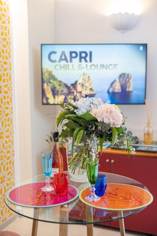 TV a/nebo společenská místnost v ubytování Suite Belvedere Capri Exclusive Rooms