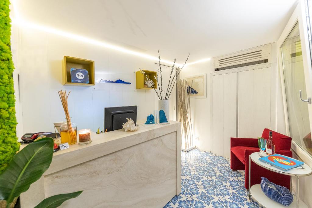 TV a/nebo společenská místnost v ubytování Suite Belvedere Capri Exclusive Rooms