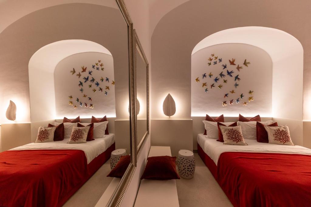 Postel nebo postele na pokoji v ubytování Suite Belvedere Capri Exclusive Rooms