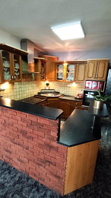 A kitchen or kitchenette at Penzion Ivka