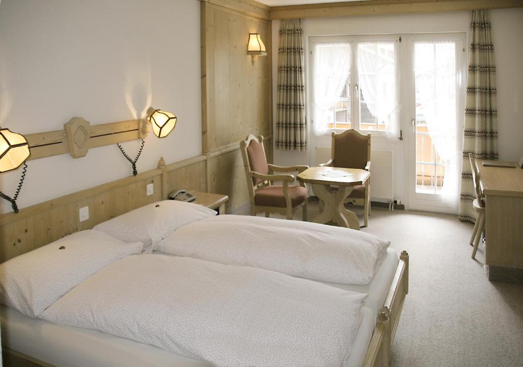Postel nebo postele na pokoji v ubytování Hotel Alte Post