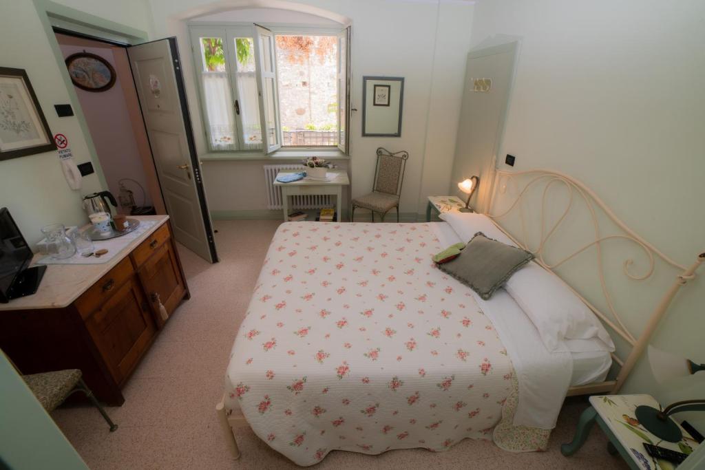 Postel nebo postele na pokoji v ubytování Agriturismo Maso Giomo