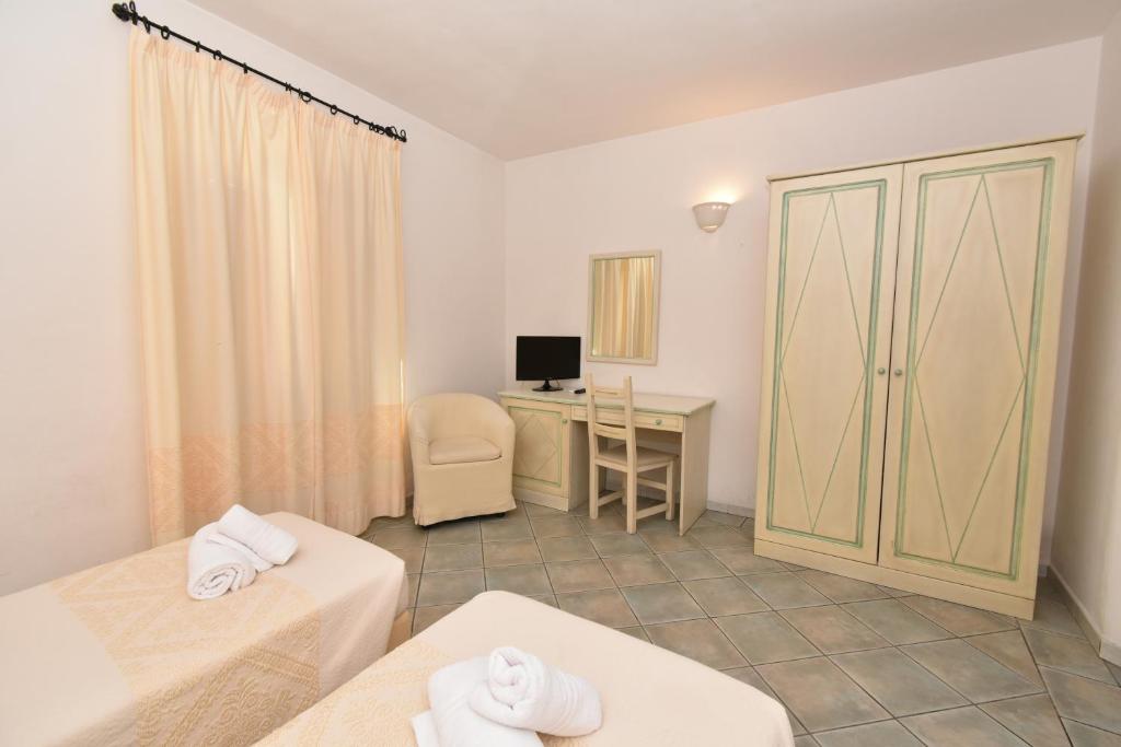 Cama ou camas em um quarto em Hotel Cavour