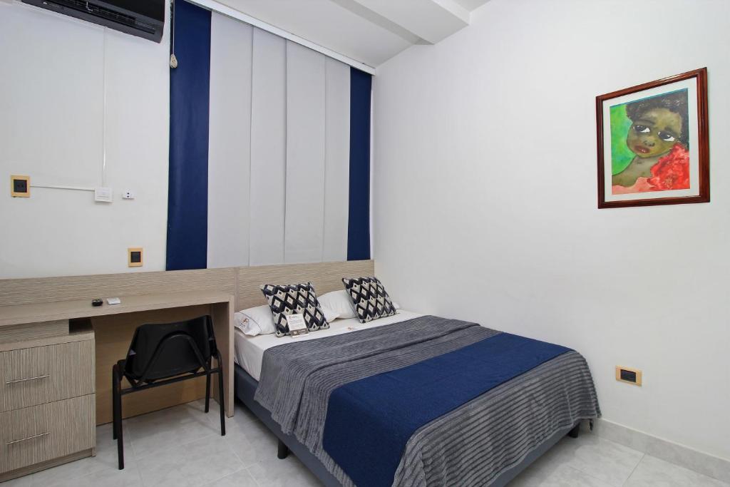 Postel nebo postele na pokoji v ubytování Hotel Emberá