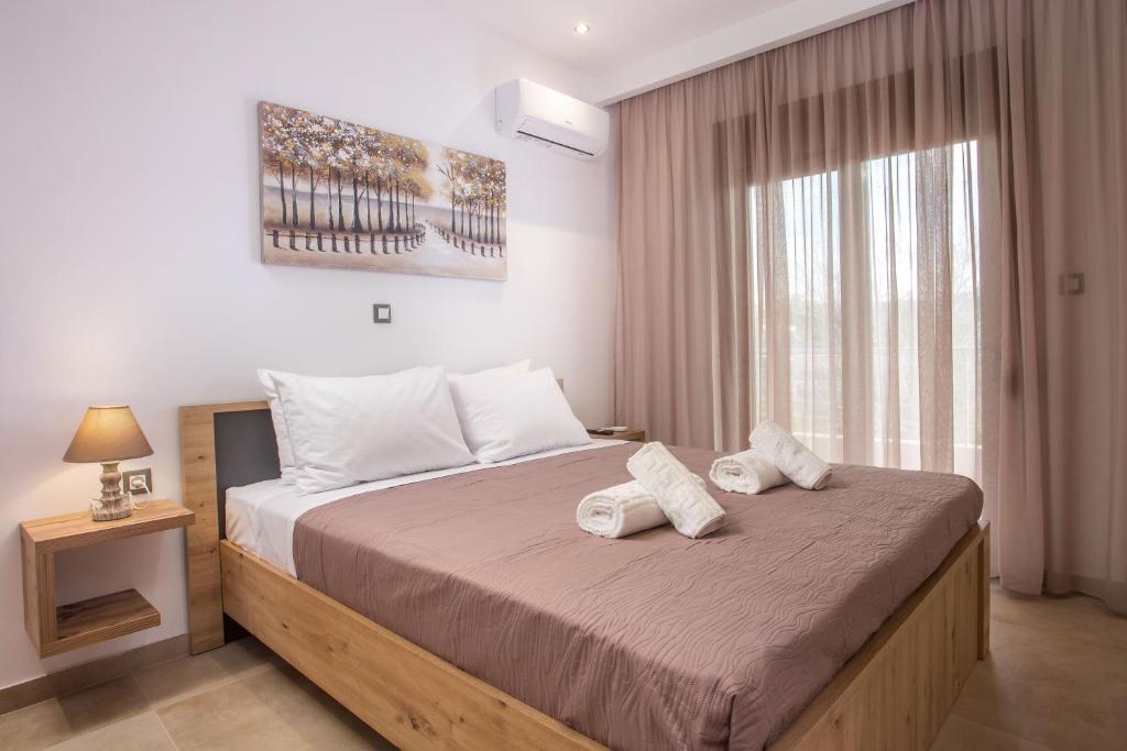 Postel nebo postele na pokoji v ubytování M&E APARTMENTS