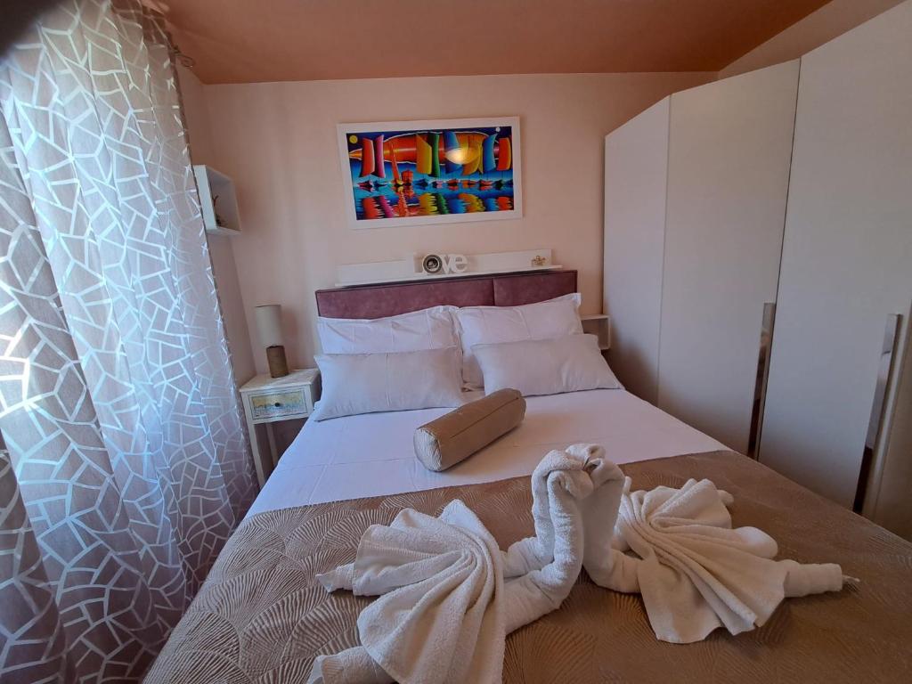 Postel nebo postele na pokoji v ubytování Apartment Bella Sanja