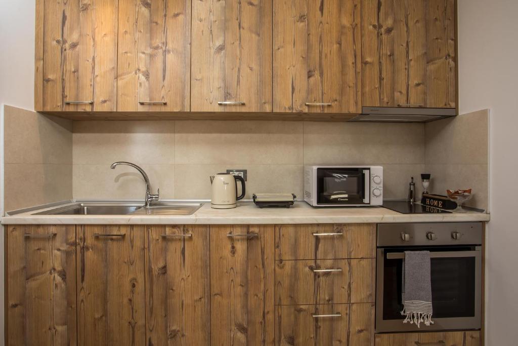 Kuchyň nebo kuchyňský kout v ubytování M&E APARTMENTS