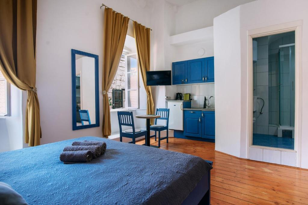 Posteľ alebo postele v izbe v ubytovaní LE MURA OLD TOWN APARTMENT by DuHomes