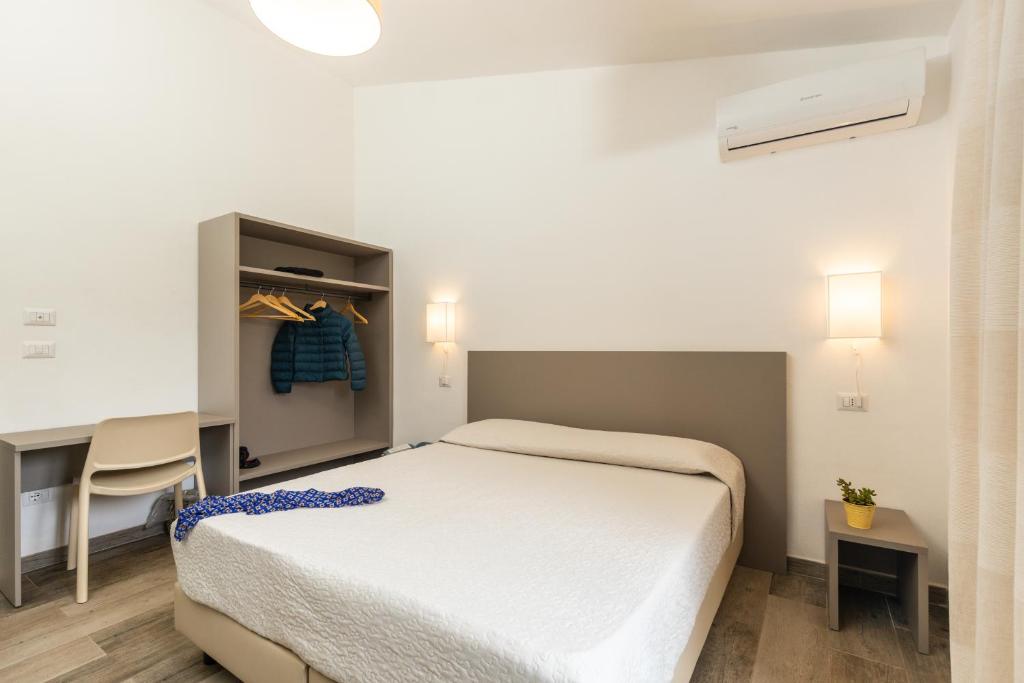 Letto o letti in una camera di Il Rifugio