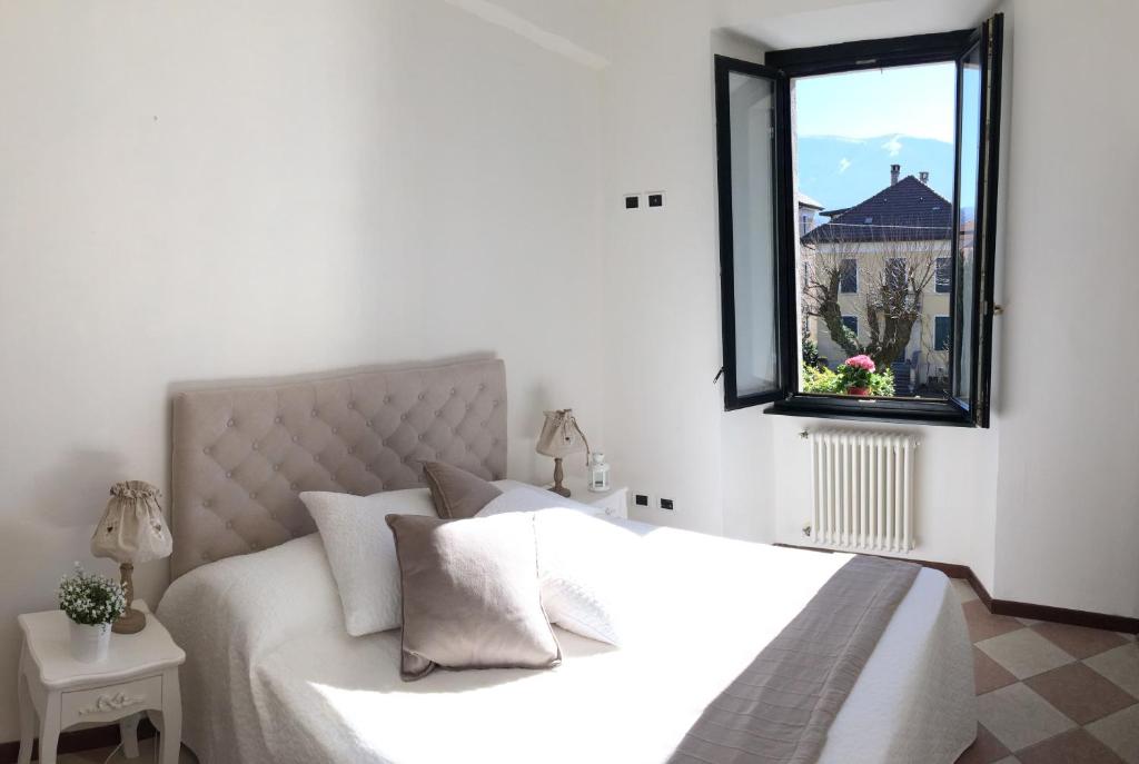 Łóżko lub łóżka w pokoju w obiekcie Hotel Villa San Fedele