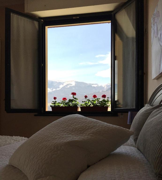 Łóżko lub łóżka w pokoju w obiekcie Hotel Villa San Fedele