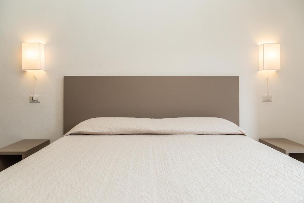 Letto o letti in una camera di Il Rifugio