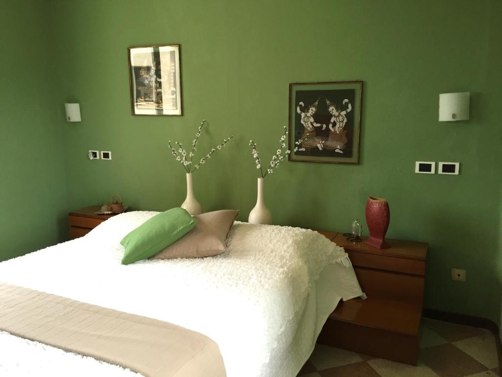 Łóżko lub łóżka w pokoju w obiekcie Hotel Villa San Fedele