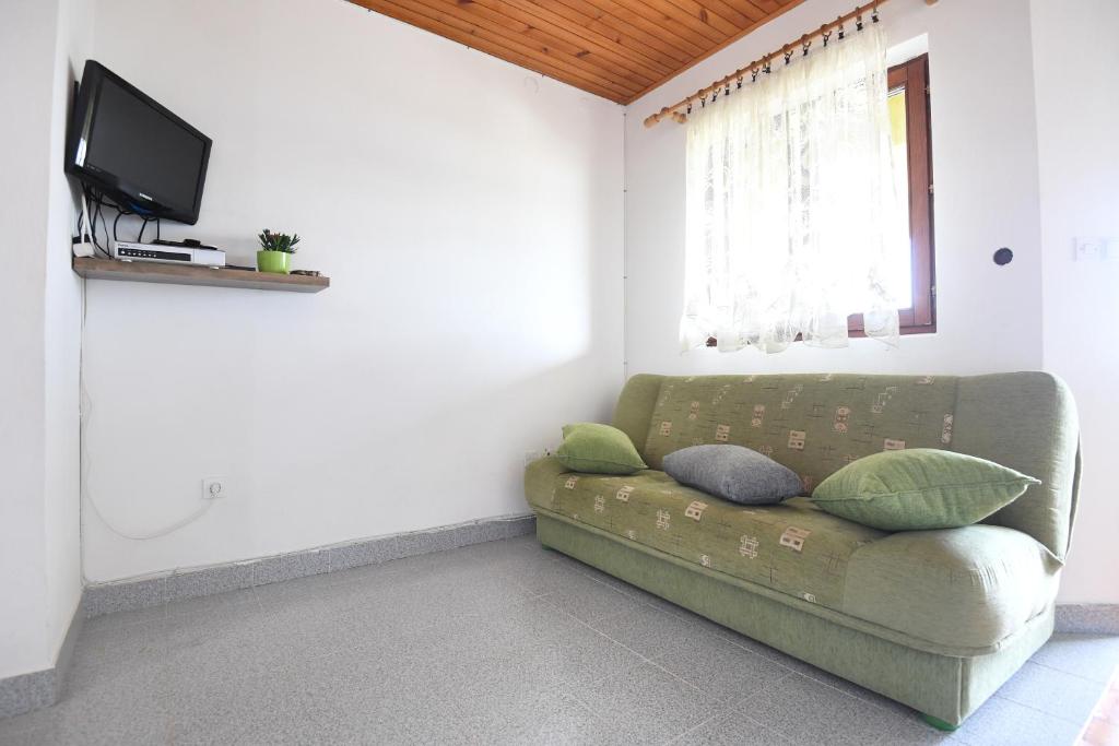 TV a/nebo společenská místnost v ubytování Apartmani Erna