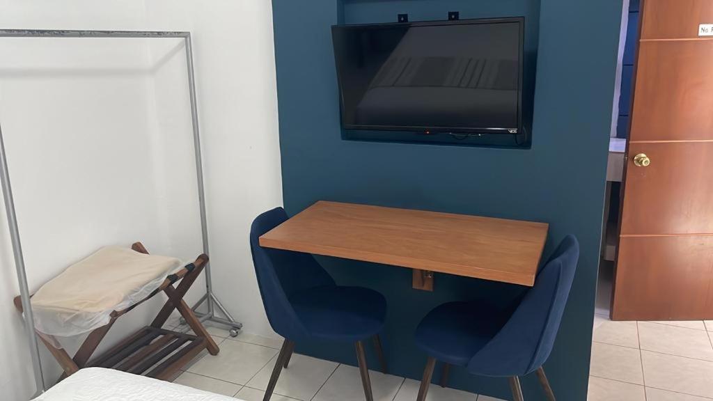 TV a/nebo společenská místnost v ubytování Hotel Real Villa