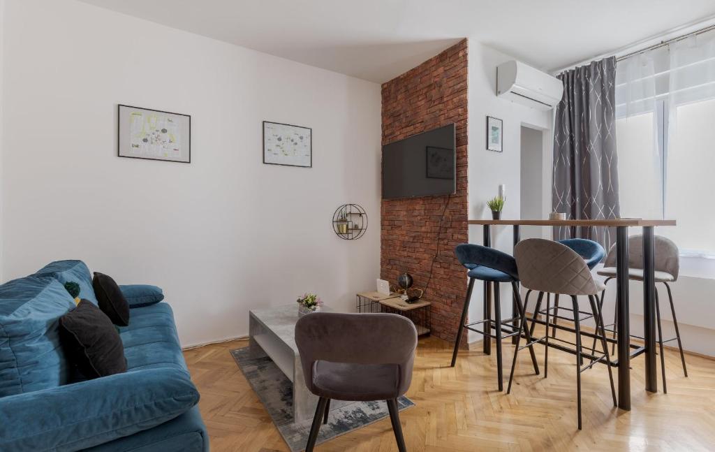 Et opholdsområde på Central Studio with private parking