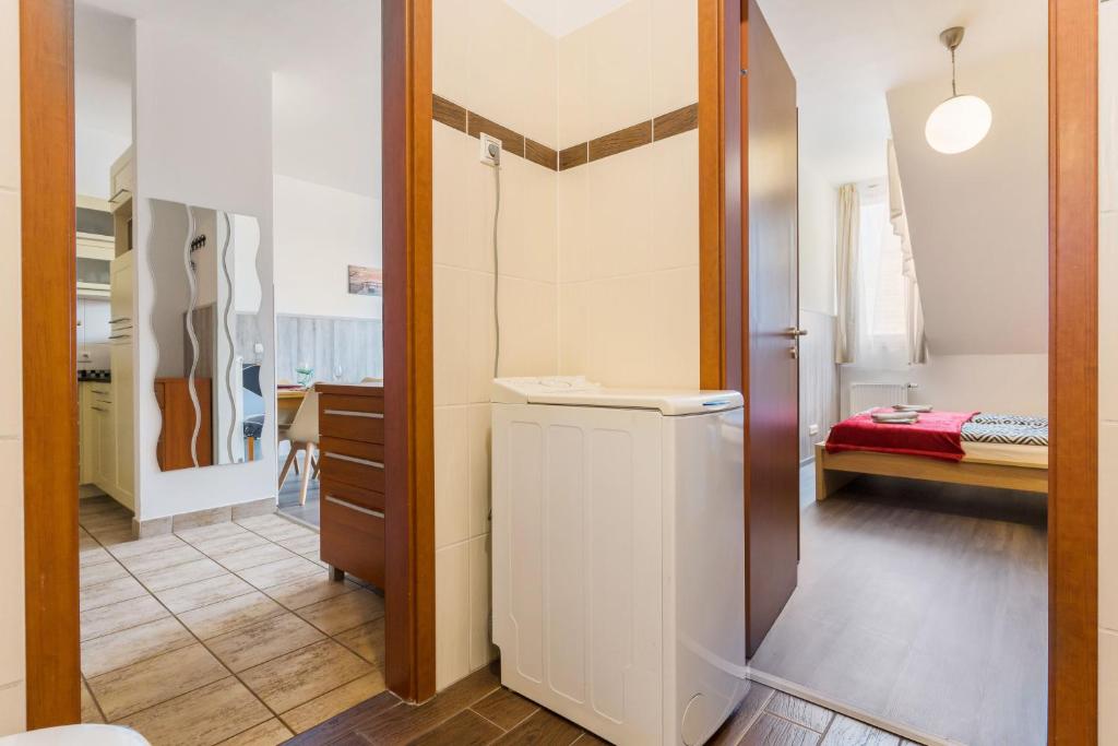 Posteľ alebo postele v izbe v ubytovaní Lovag charming apartment in the center-AC