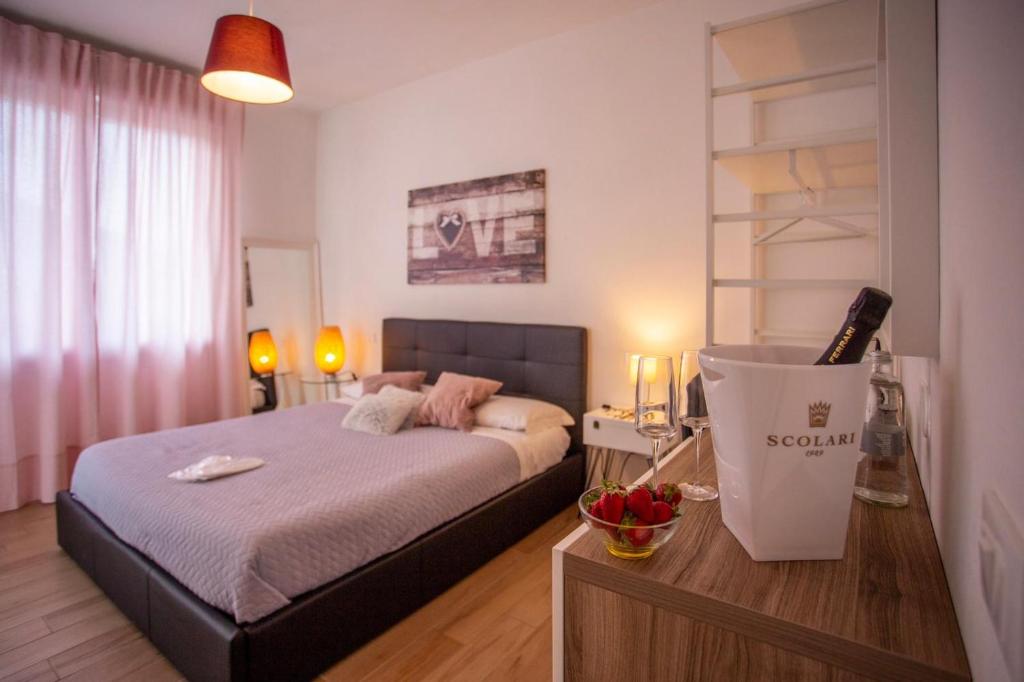 a small bedroom with a bed and a bowl of fruit at Bed And Breakfast Castello7 in San Felice del Benaco