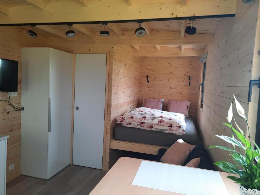 Postel nebo postele na pokoji v ubytování La roulotte de Soiron
