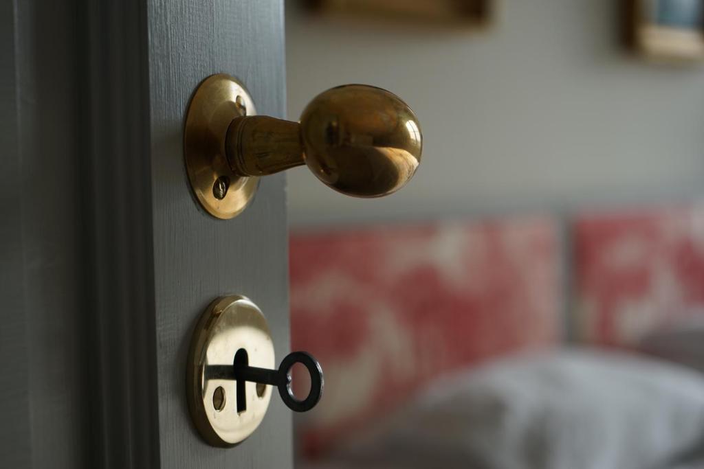Postel nebo postele na pokoji v ubytování Runnvikens Pensionat