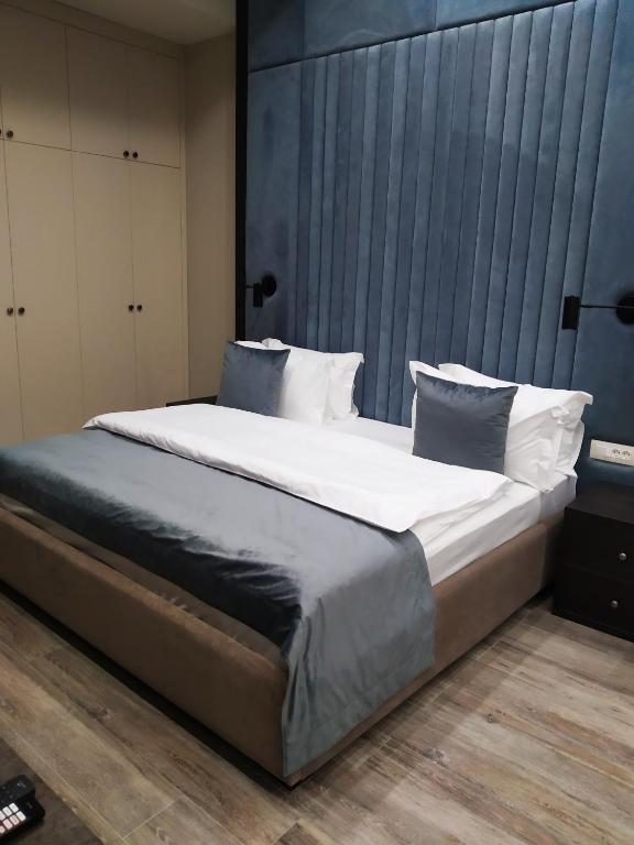 Postel nebo postele na pokoji v ubytování SOHO Hotel City Centre