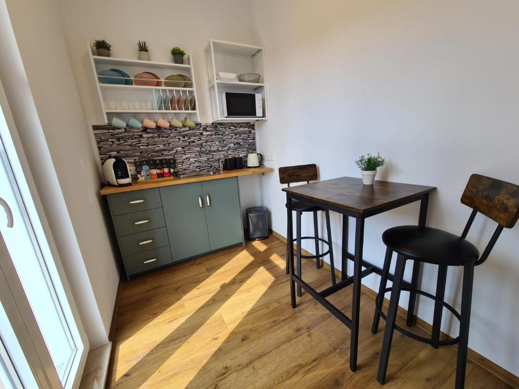 Kuchyň nebo kuchyňský kout v ubytování Hotel Gleis 3viertel Jena