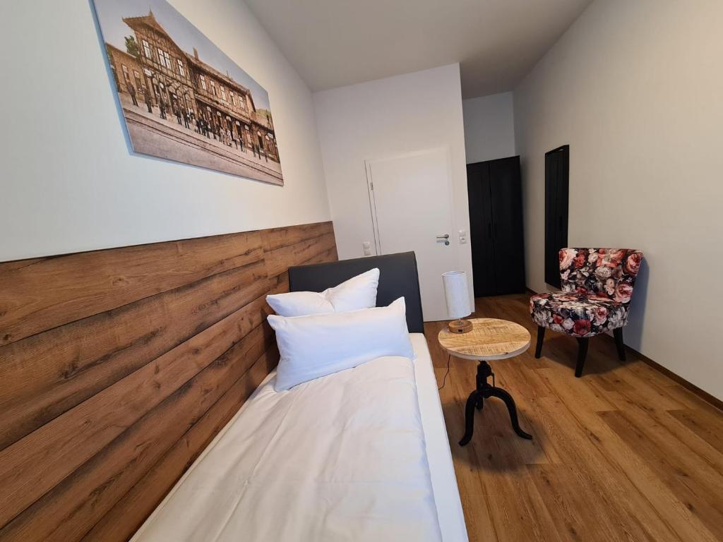 Postel nebo postele na pokoji v ubytování Hotel Gleis 3viertel Jena