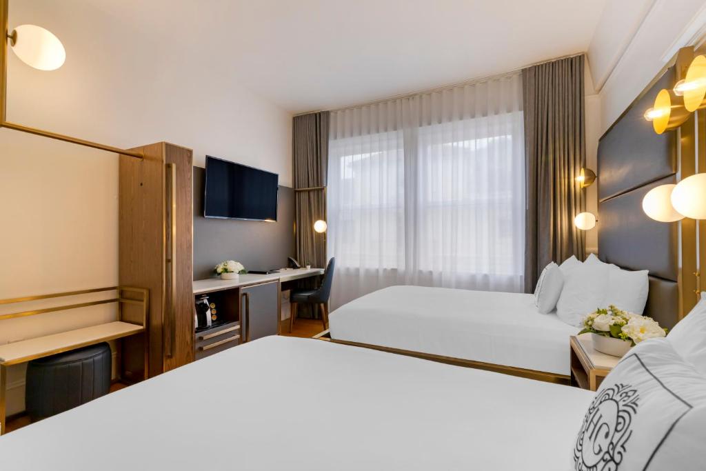 Hotel Gibbs Downtown Riverwalk - Queen Room Met Twee Queensize Bedden