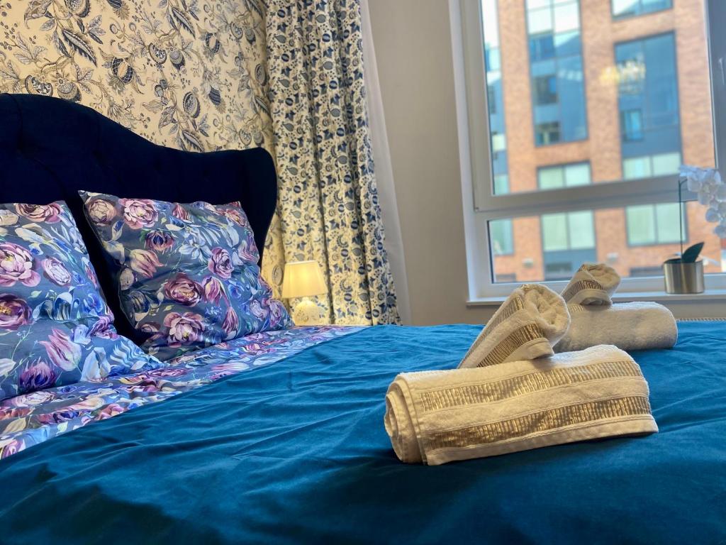 Posteľ alebo postele v izbe v ubytovaní Apartament Long Island Gdańsk