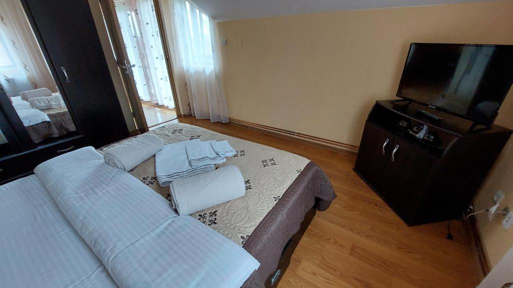 TV a/nebo společenská místnost v ubytování Vila Coman