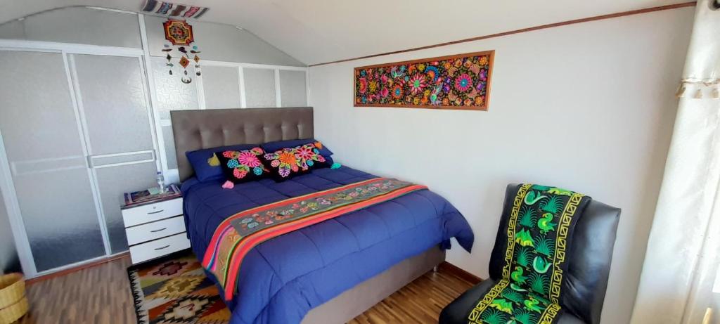 Postel nebo postele na pokoji v ubytování Uros Amaru Marka Lodge