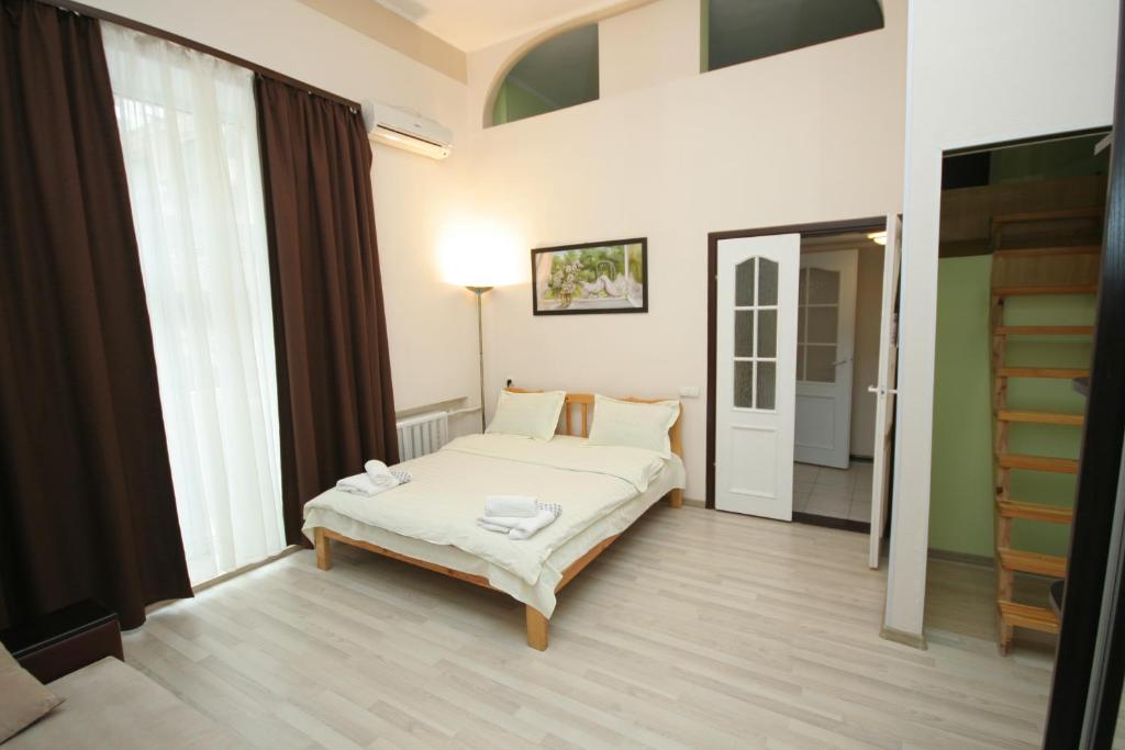 Real Home Apartments in Kiev Center - Apartment - Split Level - Mikhailovsky Pereulok 20