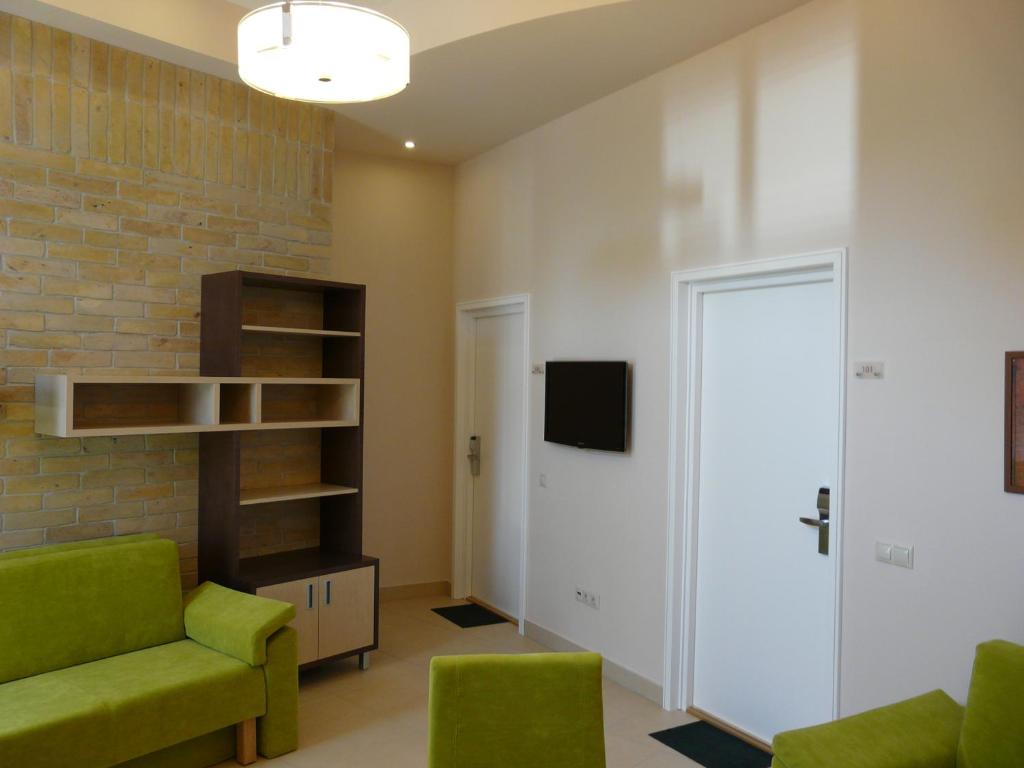 TV a/nebo společenská místnost v ubytování Soleil Apartman Szeged