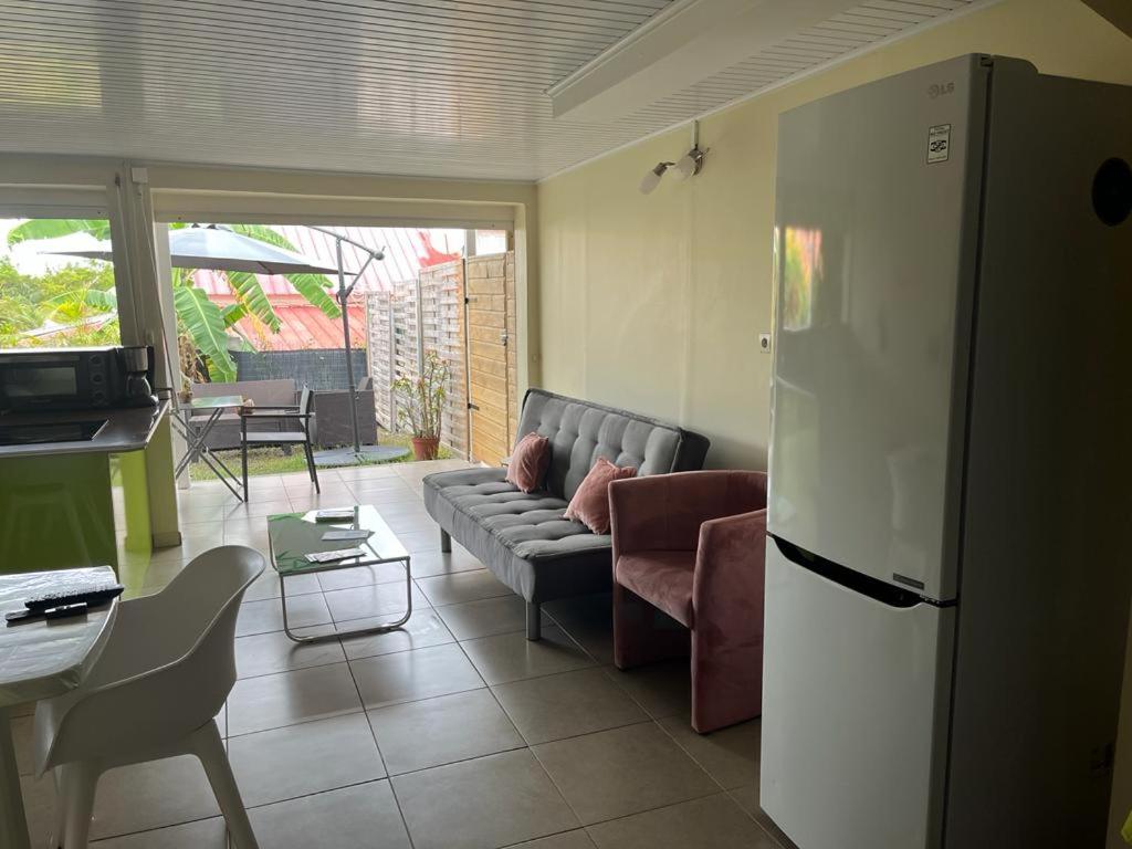 Posezení v ubytování Agréable appartement en rez-de-jardin à 450m de la mer