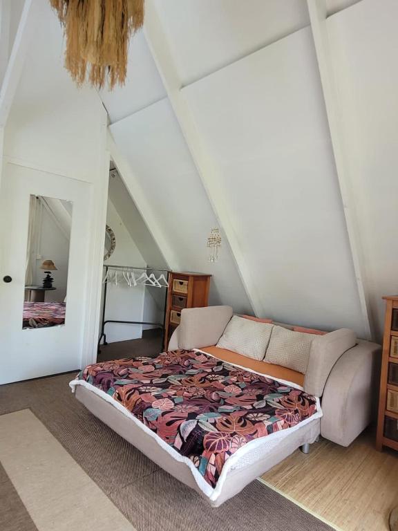 Postel nebo postele na pokoji v ubytování Fare Haurevaiti Moorea