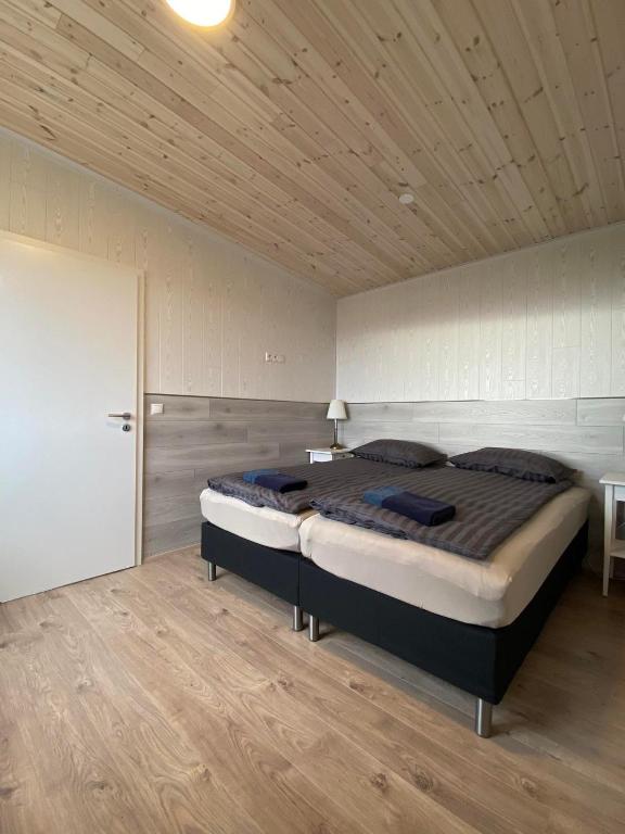 Postel nebo postele na pokoji v ubytování Brekkukot Cottages, Blönduós