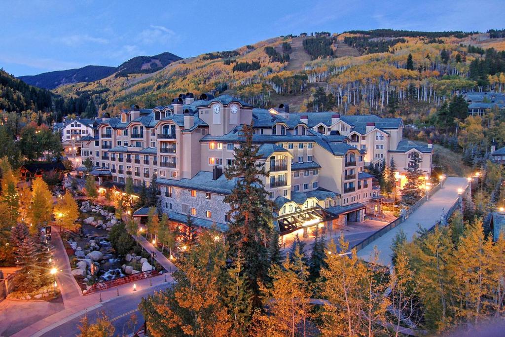 an aerial view of a resort in the mountains at night at Beaver Creek Lodge, Autograph Collection in Beaver Creek
