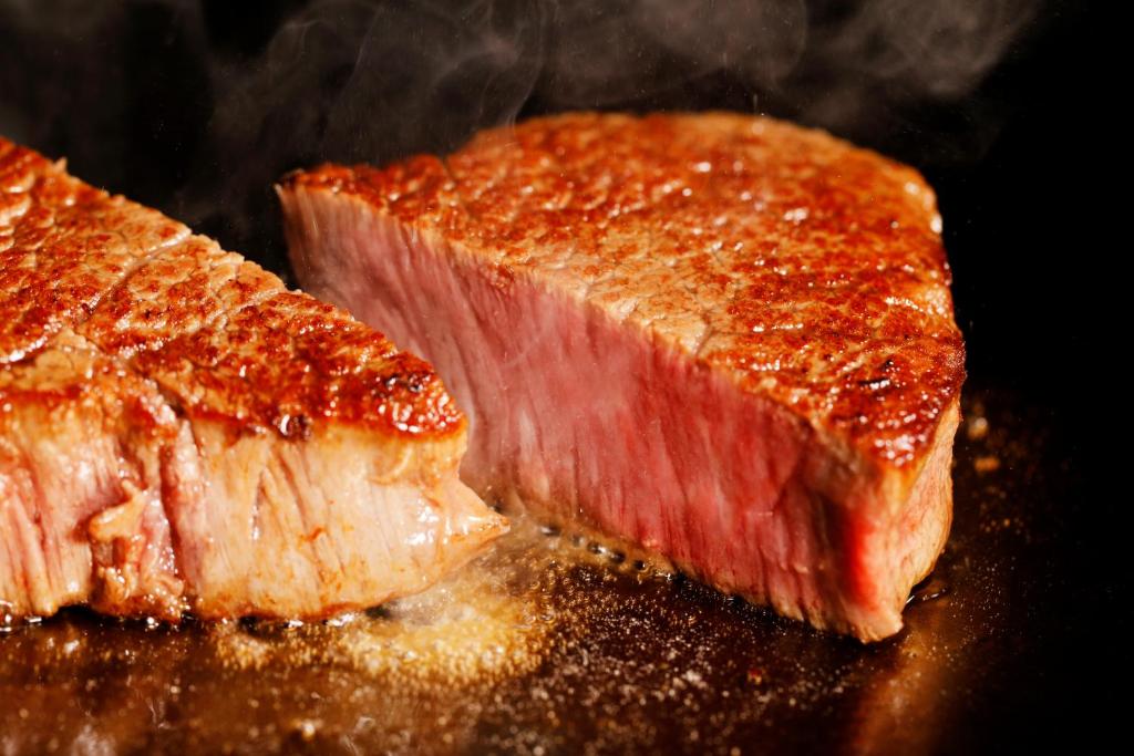 a piece of meat sitting on top of a table at Hotel Nikko Kanazawa in Kanazawa