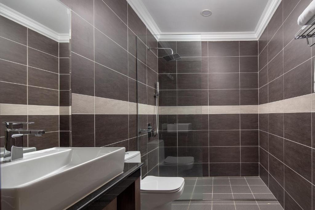 Koupelna v ubytování HM Grand Central Hotel