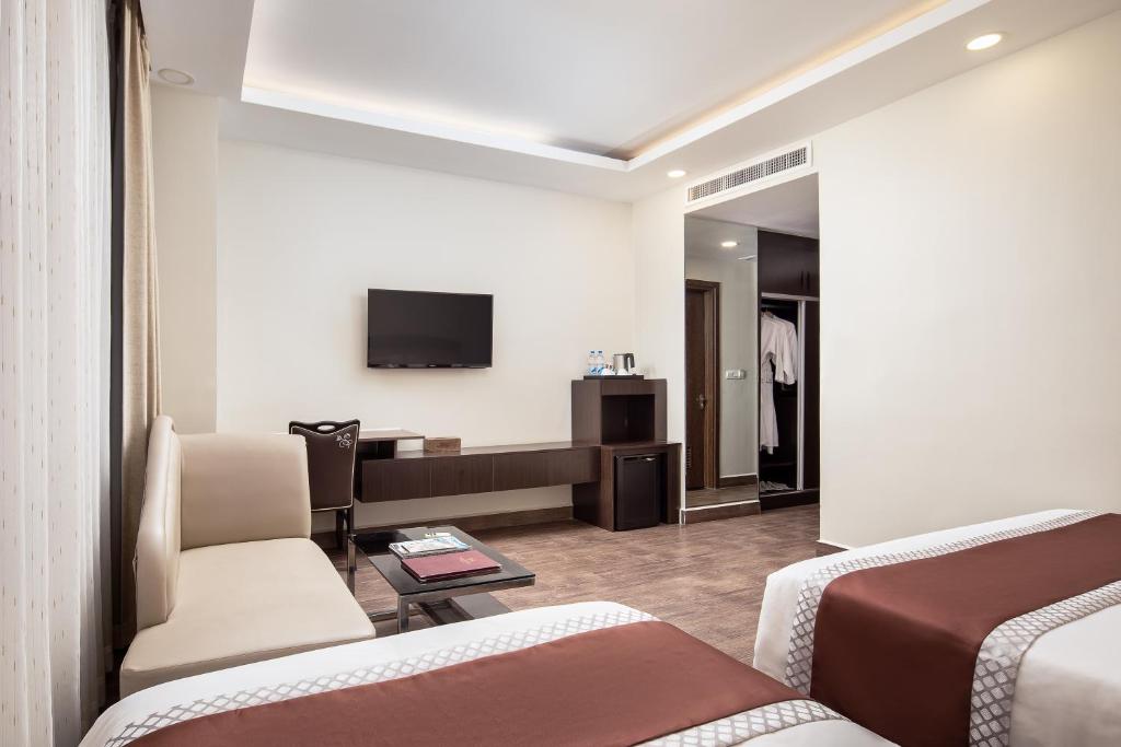 TV a/nebo společenská místnost v ubytování HM Grand Central Hotel