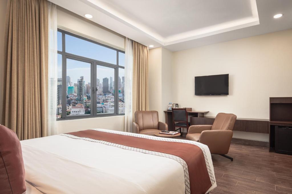 TV a/nebo společenská místnost v ubytování HM Grand Central Hotel