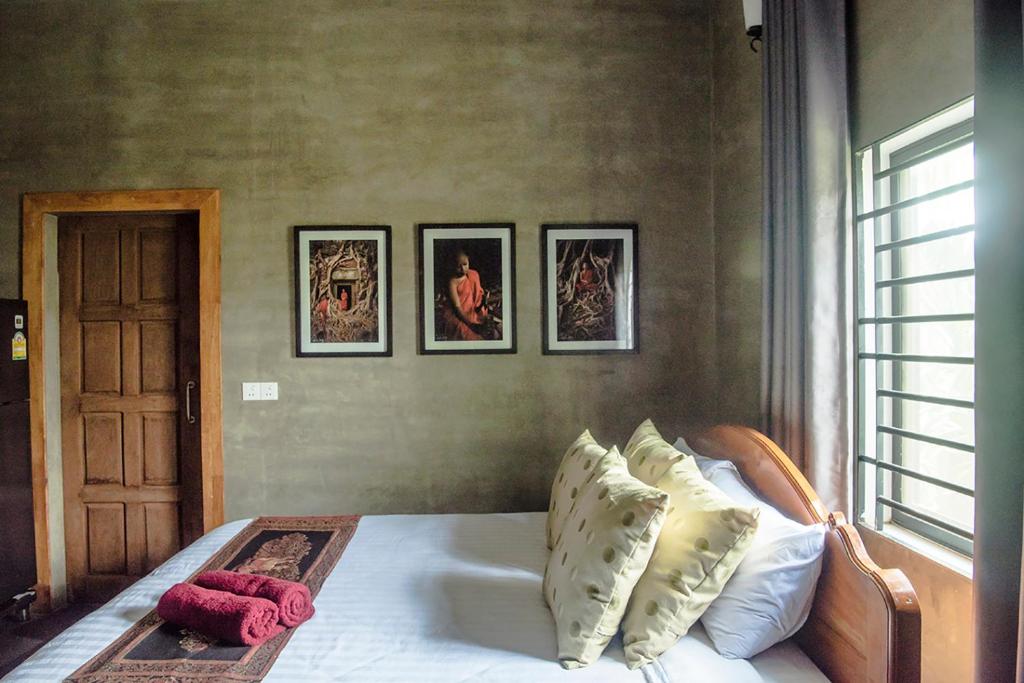 Postel nebo postele na pokoji v ubytování Koemle Home