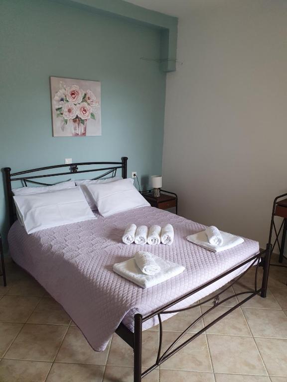 Postel nebo postele na pokoji v ubytování Vivis house