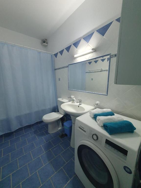 Koupelna v ubytování Vivis house