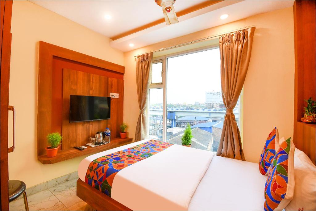 TV a/nebo společenská místnost v ubytování FabHotel Aqua Tulip - Nr Milan Mela
