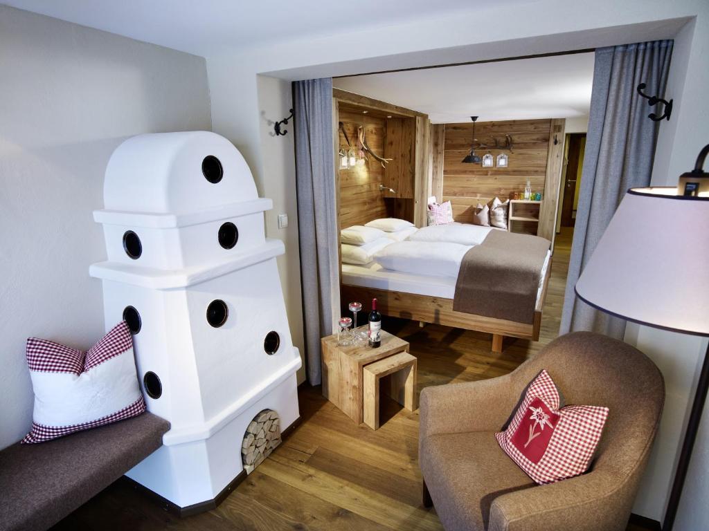 Postel nebo postele na pokoji v ubytování Hotel Alpenfriede