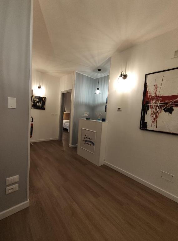 Postel nebo postele na pokoji v ubytování Loremi Rooms