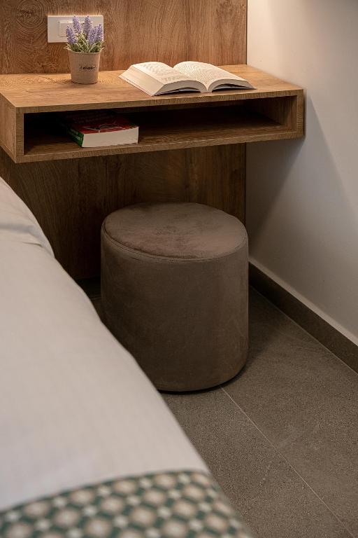 A bed or beds in a room at Casa D'Irene Apts